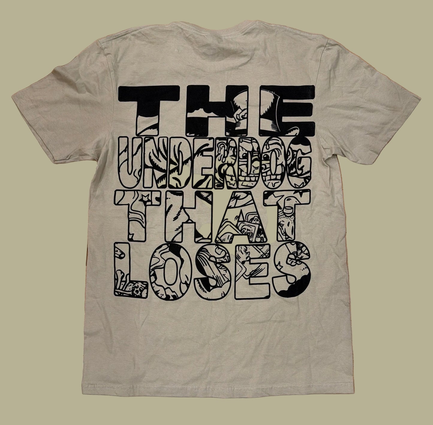 SCARAMANGA - THE UNDERDOG THAT LOSES SHIRT
